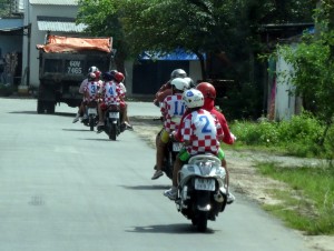 An entire kids sports team on scooters