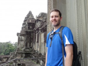 At the top of a very steep staircase, upper level of Angkor Wat