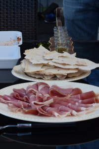 Proscuitto, potato crisps, and aquavit