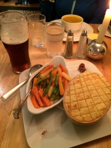Cottage pie and veggies, with vegetable soup in the background and of course a Smithwicks!